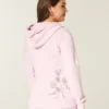 Sweat à capuche zippé avec motif rose Sweat à capuche zippé avec motif rose