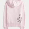 Sweat à capuche zippé avec motif rose Sweat à capuche zippé avec motif rose