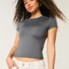 T-shirt bébé à col rond en tissu extensible et sans coutures T-shirt bébé à col rond en tissu extensible et sans coutures