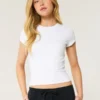 T-shirt bébé à col rond en tissu extensible et sans coutures T-shirt bébé à col rond en tissu extensible et sans coutures