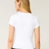 T-shirt bébé à col rond en tissu extensible et sans coutures T-shirt bébé à col rond en tissu extensible et sans coutures