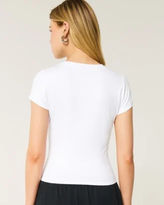 T-shirt bébé à col rond en tissu extensible et sans coutures