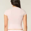 T-shirt bébé à col rond en tissu extensible et sans coutures T-shirt bébé à col rond en tissu extensible et sans coutures