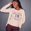 T-shirt graphique avec logo Holiday Vault Release T-shirt graphique avec logo Holiday Vault Release