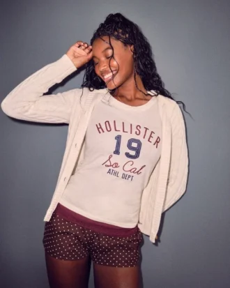 T-shirt graphique avec logo Holiday Vault Release T-shirt graphique avec logo Holiday Vault Release