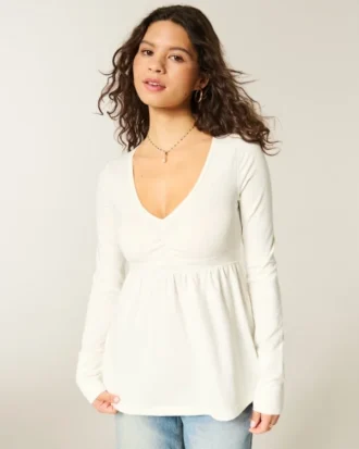 Top babydoll à manches longues et poitrine pincée