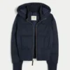 Veste bomber matelassée avec bordure en fausse fourrure Veste bomber matelassée avec bordure en fausse fourrure