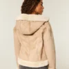 Veste à capuche en fausse peau lainée doublée de fausse fourrure