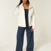 Veste toutes saisons doublée de fausse fourrure Veste toutes saisons doublée de fausse fourrure
